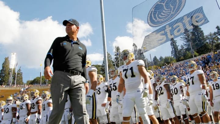 Oct 18, 2014; Berkeley, CA, USA; UCLA Bruins head coach Jim Mora Jr. stands on the field before the start of the game against the California Golden Bears at Memorial Stadium. Mandatory Credit: Cary Edmondson-USA TODAY Sports
