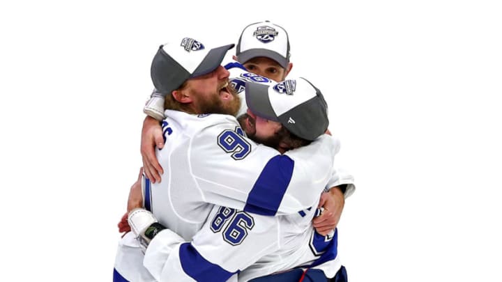EDMONTON, ALBERTA - SEPTEMBER 28: Mikhail Sergachev #98 and Nikita Kucherov #86 of the Tampa Bay Lightning celebrate following the series-winning victory over the Dallas Stars in Game Six of the 2020 NHL Stanley Cup Final at Rogers Place on September 28, 2020 in Edmonton, Alberta, Canada. (Photo by Bruce Bennett/Getty Images)