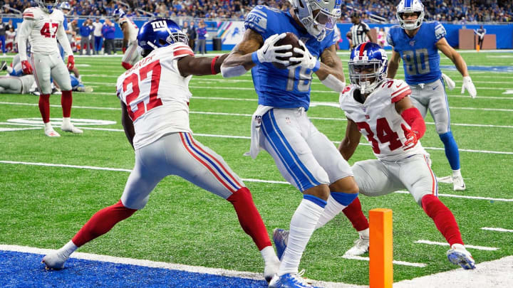 Kenny Golladay, Detroit Lions. Deandre Baker, Grant Haley, New York Giants. (Photo by Leon Halip/Getty Images)