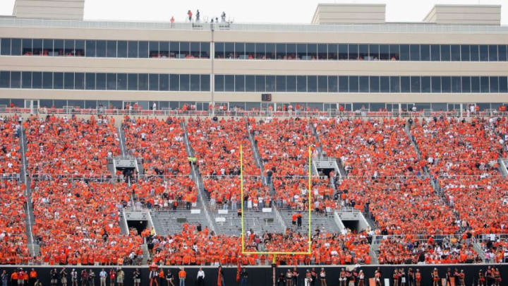 STILLWATER, OK - SEPTEMBER 05: Fans of the Oklahoma State Cowboys fill the west end zone seats during the college football game against the Georgia Bulldogs at Boone Pickens Stadium on September 5, 2009 in Stillwater, Oklahoma. The Cowboys defeated the Bulldogs 24-10. (Photo by Christian Petersen/Getty Images)