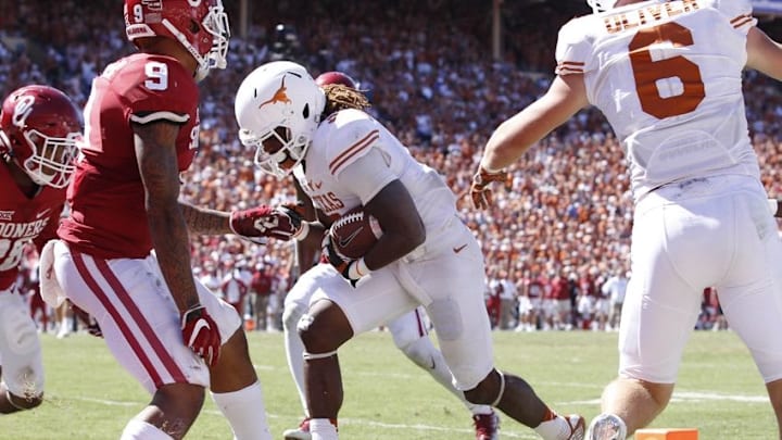 Oct 8, 2016; Dallas, TX, USA; Texas Longhorns wide receiver Armanti Foreman (3) scores a touchdown in the fourth quarter against the Oklahoma Sooners at Cotton Bowl. Oklahoma won 45-40. Mandatory Credit: Tim Heitman-USA TODAY Sports