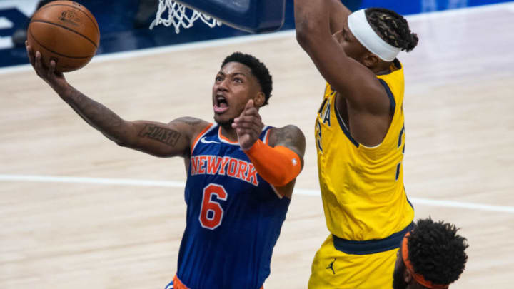 Jan 2, 2021; Indianapolis, Indiana, USA; New York Knicks guard Elfrid Payton (6) shoots the ball while Indiana Pacers center Myles Turner (33) defends in the fourth quarter at Bankers Life Fieldhouse. Mandatory Credit: Trevor Ruszkowski-USA TODAY Sports