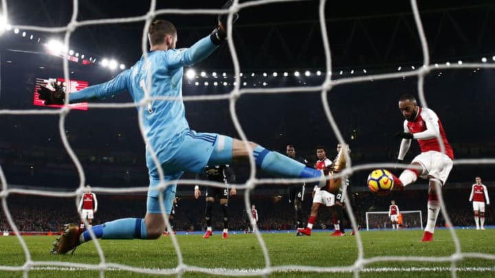 LONDON, ENGLAND - DECEMBER 02: Alexandre Lacazette of Arsenal scores his sides first goal during the Premier League match between Arsenal and Manchester United at Emirates Stadium on December 2, 2017 in London, England. (Photo by Julian Finney/Getty Images)