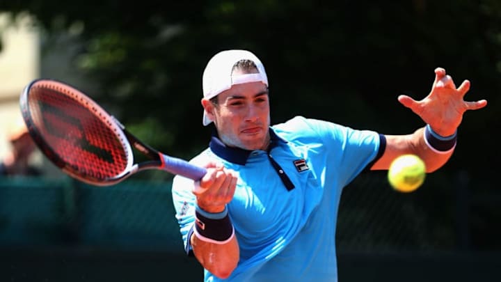 PARIS, FRANCE - JUNE 01: John Isner of The United States plays a forehand during the mens singles second round match against Paolo Lorenzi of Italy on day five of the 2017 French Open at Roland Garros on June 1, 2017 in Paris, France. (Photo by Alex Pantling/Getty Images)