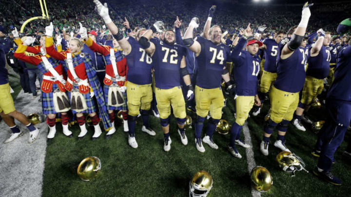 SOUTH BEND, IN - OCTOBER 12: Notre Dame Fighting Irish players celebrate after a game against the USC Trojans at Notre Dame Stadium on October 12, 2019 in South Bend, Indiana. Notre Dame defeated USC 30-27. (Photo by Joe Robbins/Getty Images)