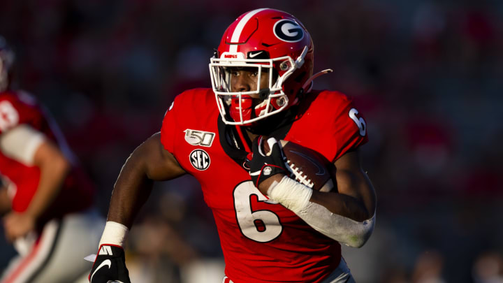 ATHENS, GA – SEPTEMBER 7: Kenny McIntosh #6 of the Georgia Bulldogs rushes against the Murray State Racers during the second half at Sanford Stadium on September 7, 2019 in Athens, Georgia. (Photo by Carmen Mandato/Getty Images)