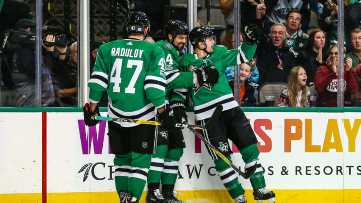 DALLAS, TX - NOVEMBER 18: Dallas Stars left wing Antoine Roussel (21) celebrates scoring goal with his teammates during the game between the Dallas Stars and the Edmonton Oilers on November 18, 2017 at the American Airlines Center in Dallas, Texas. Dallas defeats Edmonton 6-3.(Photo by Matthew Pearce/Icon Sportswire via Getty Images)