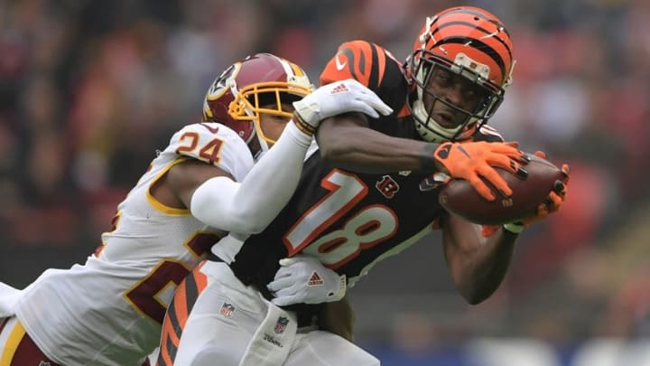 Oct 30, 2016; London, United Kingdom; Cincinnati Bengals wide receiver A.J. Green (18) is defended by Washington Redskins cornerback Josh Norman (24) in the second quarter during game 17 of the NFL International Series at Wembley Stadium. Mandatory Credit: Kirby Lee-USA TODAY Sports