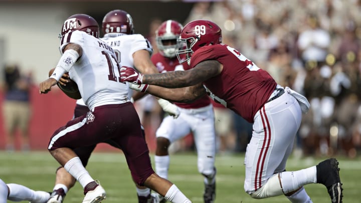 TUSCALOOSA, AL – SEPTEMBER 22: Kellen Mond #11 of the Texas A&M Aggies is chased down from behind in the first quarter by Raekwon Davis #99 of the Alabama Crimson Tide at Bryant-Denny Stadium on September 22, 2018 in Tuscaloosa, Alabama. (Photo by Wesley Hitt/Getty Images)