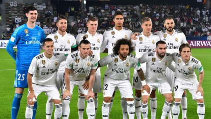 (Top L to R) Real Madrid's Belgian goalkeeper Thibaut Courtois, Real Madrid's Spanish defender Sergio Ramos, Real Madrid's German midfielder Toni Kroos, Real Madrid's French defender Raphael Varane, Real Madrid's Spanish midfielder Marcos Llorente, Real Madrid's French forward Karim Benzema, (bottom L to R) Real Madrid's Spanish midfielder Lucas Vazquez, Real Madrid's Welsh forward Gareth Bale, Real Madrid's Brazilian defender Marcelo, Real Madrid's Spanish defender Dani Carvajal and Real Madrid's Croatian midfielder Luka Modric pose for a group picture during the semi final football match of the FIFA Club World Cup 2018 tournament between Japan's Kashima Antlers and Spain's Real Madrid at the Zayed Sports City Stadium in Abu Dhabi, the capital of the United Arab Emirates, on December 19, 2018. (Photo by Giuseppe CACACE / AFP) (Photo credit should read GIUSEPPE CACACE/AFP/Getty Images)