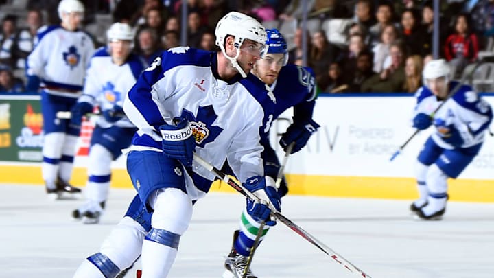 TORONTO, ON – JANUARY 24 : T.J. Brennan #3 of the Toronto Marlies controls the puck against the Utica Comets on January 24, 2016 at the Ricoh Coliseum in Toronto, Ontario, Canada. (Photo by Graig Abel/Getty Images)