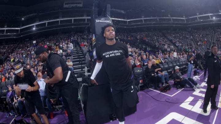SACRAMENTO, CA - MARCH 25: Buddy Hield #24 of the Sacramento Kings warms up with a shirt to honor Stephon Clark during the game against the Boston Celtics on March 25, 2018 at Golden 1 Center in Sacramento, California. NOTE TO USER: User expressly acknowledges and agrees that, by downloading and or using this photograph, User is consenting to the terms and conditions of the Getty Images Agreement. Mandatory Copyright Notice: Copyright 2018 NBAE (Photo by Rocky Widner/NBAE via Getty Images)