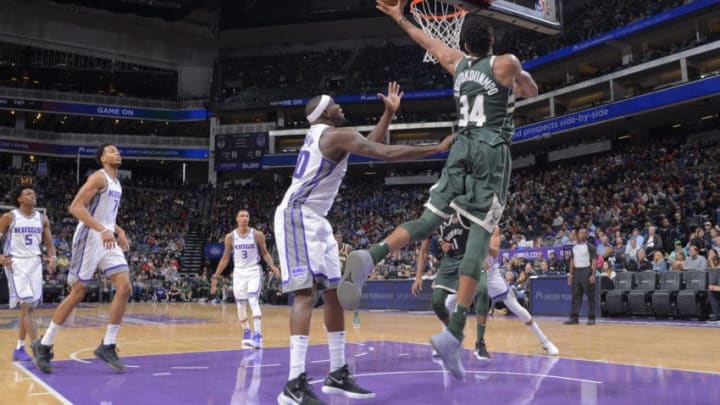 SACRAMENTO, CA - NOVEMBER 28: Giannis Antetokounmpo #34 of the Milwaukee Bucks puts up a shot against Zach Randolph #50 of the Sacramento Kings on November 28, 2017 at Golden 1 Center in Sacramento, California. NOTE TO USER: User expressly acknowledges and agrees that, by downloading and or using this photograph, User is consenting to the terms and conditions of the Getty Images Agreement. Mandatory Copyright Notice: Copyright 2017 NBAE (Photo by Rocky Widner/NBAE via Getty Images)