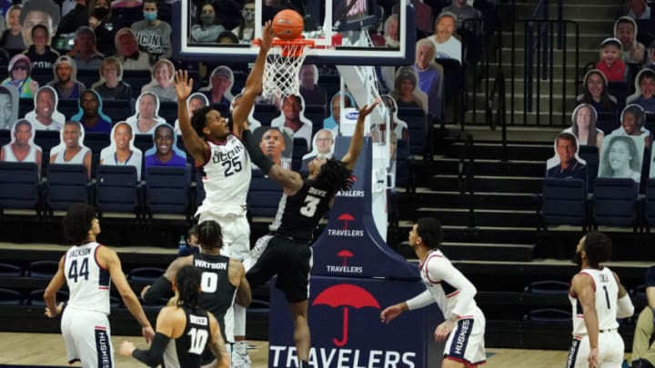 Feb 16, 2021; Storrs, Connecticut, USA; Providence Friars guard David Duke (3) shoots against Connecticut Huskies forward Josh Carlton (25) in the first half at Harry A. Gampel Pavilion. Mandatory Credit: David Butler II-USA TODAY Sports