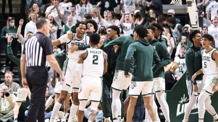 EAST LANSING, MI – MARCH 06: Marcus Bingham Jr. #30 of the Michigan State Spartans celebrates with his teammates after his made basket against the Maryland Terrapins at Breslin Center on March 6, 2022 in East Lansing, Michigan. (Photo by Rey Del Rio/Getty Images)