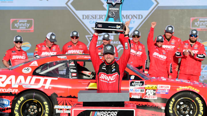 AVONDALE, ARIZONA - NOVEMBER 09: Justin Allgaier, driver of the #7 BRANDT Professional Agriculture Chevrolet, celebrates in Victory Lane after winning the NASCAR Xfinity Series Desert Diamond Casino West Valley 200 at ISM Raceway on November 09, 2019 in Avondale, Arizona. (Photo by Jared C. Tilton/Getty Images)
