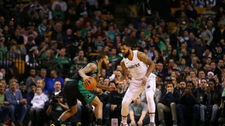BOSTON, MA - MARCH 14: Marcus Morris #13 of the Boston Celtics is guarded by Markieff Morris #5 of the Washington Wizards during a game at TD Garden on March 14, 2018 in Boston, Massachusetts. NOTE TO USER: User expressly acknowledges and agrees that, by downloading and or using this photograph, User is consenting to the terms and conditions of the Getty Images License Agreement. (Photo by Adam Glanzman/Getty Images)