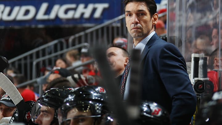 NEWARK, NJ – DECEMBER 11: Assistant coach Alain Nasreddine of the New Jersey Devils works the bench against the Detroit Red Wings at the Prudential Center on December 11, 2015 in Newark, New Jersey. The Devils defeated the Red Wings 3-2 in overtime. (Photo by Bruce Bennett/Getty Images)