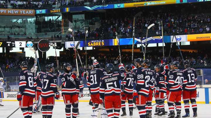 NEW YORK, NY – JANUARY 1: The New York Rangers salute the fans after the 2018 Bridgestone NHL Winter Classic at Citi Field on January 1, 2018 in New York, New York. The Rangers won, 3-2.(Photo by Bill Wippert/NHLI via Getty Images)