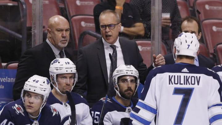 SUNRISE, FLORIDA - NOVEMBER 14: Head coach Paul Maurice and assistant coach Charlie Huddy of the Winnipeg Jets huddle with the team against the Florida Panthers during the third period at BB&T Center on November 14, 2019 in Sunrise, Florida. (Photo by Michael Reaves/Getty Images)