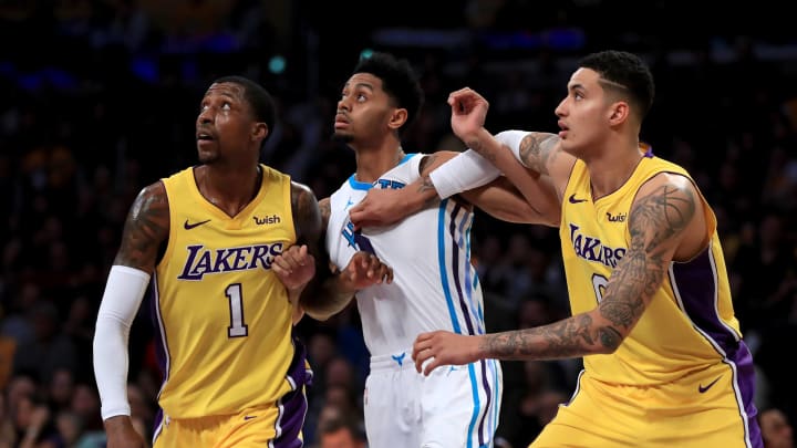 LOS ANGELES, CA – JANUARY 05: Kentavious Caldwell-Pope #1 and Kyle Kuzma #0 of the Los Angeles Lakers box out Jeremy Lamb #3 of the Charlotte Hornets on a foul shot during the first half of a game at Staples Center on January 5, 2018 in Los Angeles, California. NOTE TO USER: User expressly acknowledges and agrees that, by downloading and or using this photograph, User is consenting to the terms and conditions of the Getty Images License Agreement. (Photo by Sean M. Haffey/Getty Images)