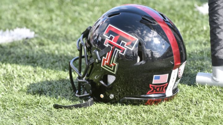 LAWRENCE, KS - OCTOBER 7: A Texas Tech Red Raiders helmet rest on the field during a game against the Kansas Jayhawks at Memorial Stadium on October 7, 2017 in Lawrence, Kansas. (Photo by Ed Zurga/Getty Images) *** Local Caption ***
