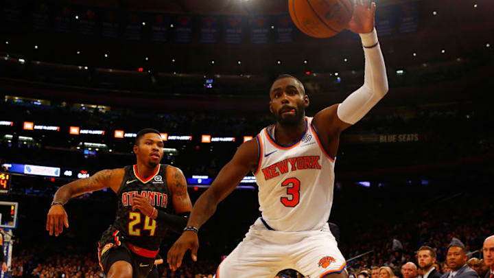 NEW YORK, NY - OCTOBER 17: Tim Hardaway Jr. #3 of the New York Knicks and Kent Bazemore #24 of the Atlanta Hawks pursue th eloose ball at Madison Square Garden on October 17, 2018 in New York City. NOTE TO USER: User expressly acknowledges and agrees that, by downloading and or using this photograph, User is consenting to the terms and conditions of the Getty Images License Agreement. (Photo by Mike Stobe/Getty Images)