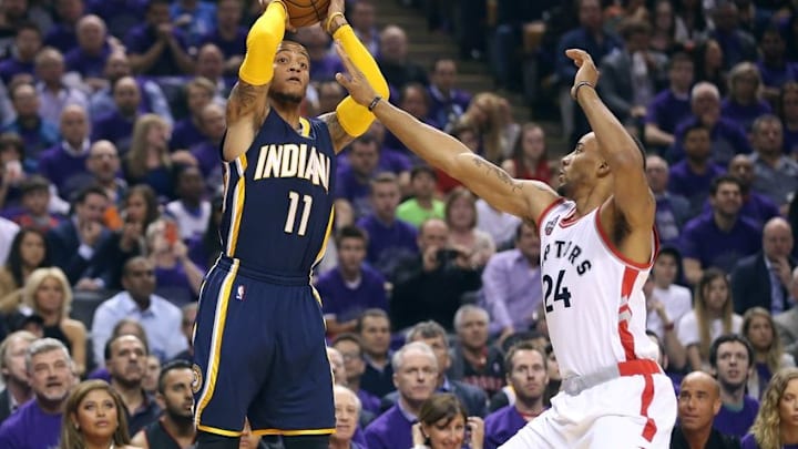 Apr 18, 2016; Toronto, Ontario, CAN; Indiana Pacers point guard Monta Ellis (11) shoots against Toronto Raptors guard Norman Powell (24) in game two of the first round of the 2016 NBA Playoffs at Air Canada Centre. The Raptors beat the Pacers 98-87. Mandatory Credit: Tom Szczerbowski-USA TODAY Sports