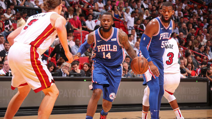 MIAMI, FL – APRIL 9: Jonathon Simmons #14 of the Philadelphia 76ers handles the ball during the game against Kelly Olynyk #9 of the Miami Heat on April 9, 2019 at American Airlines Arena in Miami, Florida. NOTE TO USER: User expressly acknowledges and agrees that, by downloading and or using this Photograph, user is consenting to the terms and conditions of the Getty Images License Agreement. Mandatory Copyright Notice: Copyright 2019 NBAE (Photo by Issac Baldizon/NBAE via Getty Images)