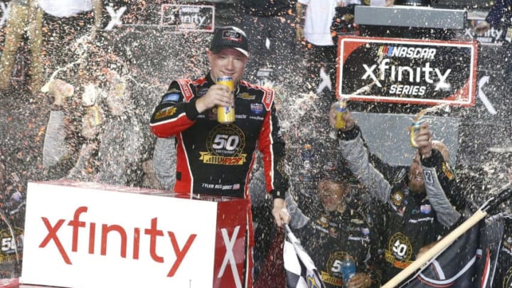 HOMESTEAD, FLORIDA - NOVEMBER 16: Tyler Reddick, driver of the #2 Tame the Beast Chevrolet, celebrates in Victory Lane after winning the NASCAR Xfinity Series Ford EcoBoost 300 and the NASCAR Xfinity Series Championship at Homestead-Miami Speedway on November 16, 2019 in Homestead, Florida. (Photo by Brian Lawdermilk/Getty Images)
