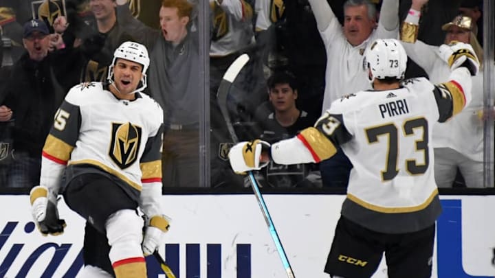 LAS VEGAS, NEVADA - DECEMBER 23: Ryan Reaves #75 and Brandon Pirri #73 of the Vegas Golden Knights celebrate after Pirri assisted Reaves on a third-period power-play goal against the Los Angeles Kings during their game at T-Mobile Arena on December 23, 2018 in Las Vegas, Nevada. The Kings defeated the Golden Knights 4-3 in overtime. (Photo by Ethan Miller/Getty Images)