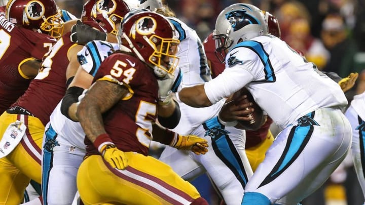 Dec 19, 2016; Landover, MD, USA; Carolina Panthers quarterback Cam Newton (1) is sacked by Washington Redskins defensive end Chris Baker (92) and Redskins linebacker Mason Foster (54) in the second quarter at FedEx Field. Mandatory Credit: Geoff Burke-USA TODAY Sports