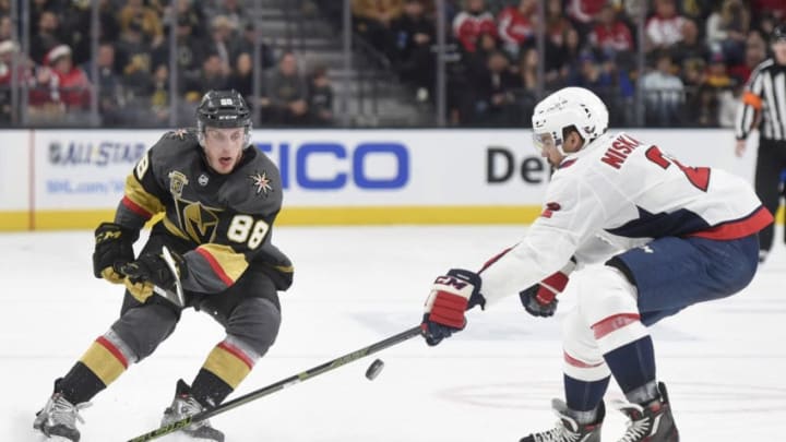 LAS VEGAS, NV - DECEMBER 23: Matt Niskanen #2 of the Washington Capitals defends Nate Schmidt #88 of the Vegas Golden Knights during the game at T-Mobile Arena on December 23, 2017 in Las Vegas, Nevada. (Photo by David Becker/NHLI via Getty Images)