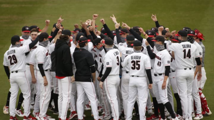 Feb 19, 2021; Athens, Georgia, USA; Members of the Georgia Bulldogs huddle on opening day at Foley Field before a game against the Evansville Aces Aces. Evansville Aces won 3-2. Mandatory Credit: Joshua L. Jones/Athens Banner-Herald via USA TODAY NETWORK