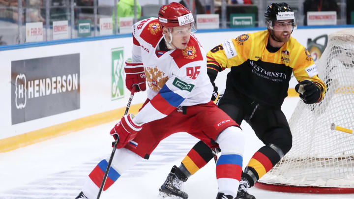 SOCHI, RUSSIA – APRIL 7, 2018: Yegor Korshkov (L) of the Russian Olympic men’s ice hockey team and Germanys Pascal Zerressen in their 2018 Euro Hockey Challenge second leg ice hockey match at Bolshoy Ice Dome. Anton Novoderezhkin/TASS (Photo by Anton NovoderezhkinTASS via Getty Images)