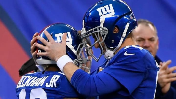 Dec 18, 2016; East Rutherford, NJ, USA; New York Giants wide receiver Odell Beckham (13) celebrates with quarterback Eli Manning (10) after scoring a touchdown against the Lions during the second half at MetLife Stadium. Mandatory Credit: Robert Deutsch-USA TODAY Sports