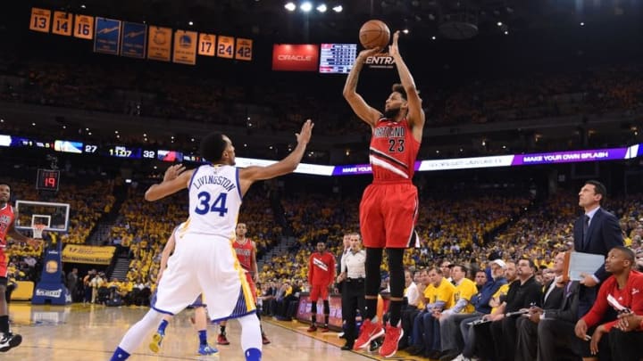 May 11, 2016; Oakland, CA, USA; Portland Trail Blazers guard Allen Crabbe (23) shoots the basketball against Golden State Warriors guard Shaun Livingston (34) during the first quarter in game five of the second round of the NBA Playoffs at Oracle Arena. Mandatory Credit: Kyle Terada-USA TODAY Sports