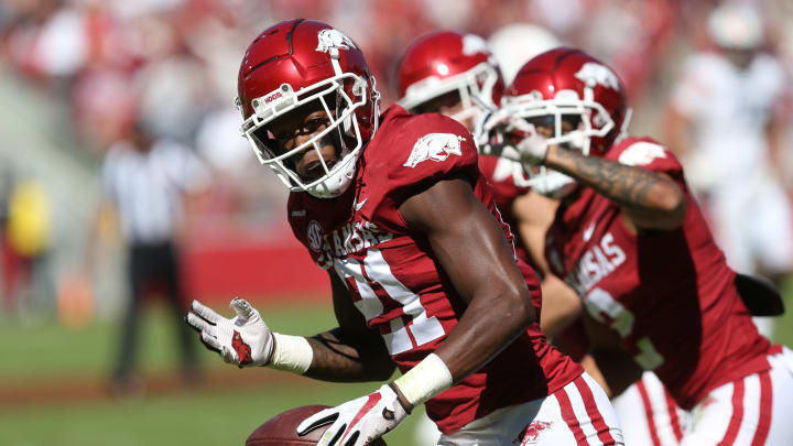 Oct 16, 2021; Fayetteville, Arkansas, USA; Arkansas Razorbacks defensive back Montaric Brown (21) celebrates after intercepting a pass against the Auburn Tigers during the second quarter at Donald W. Reynolds Razorback Stadium. Mandatory Credit: Nelson Chenault-USA TODAY Sports