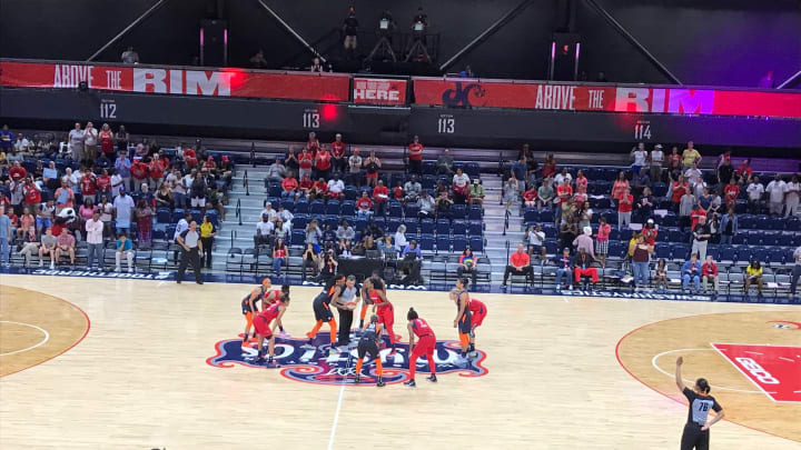 The Washington Mystics and Connecticut Sun prepare for the opening tip on July 29, 2019. Photo by Jenn Hatfield.