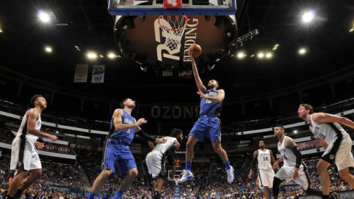 ORLANDO, FL - OCTOBER 27: Evan Fournier #10 of the Orlando Magic drives to the basket against the San Antonio Spurs on October 27, 2017 at Amway Center in Orlando, Florida. NOTE TO USER: User expressly acknowledges and agrees that, by downloading and or using this photograph, User is consenting to the terms and conditions of the Getty Images License Agreement. Mandatory Copyright Notice: Copyright 2017 NBAE (Photo by Fernando Medina/NBAE via Getty Images)