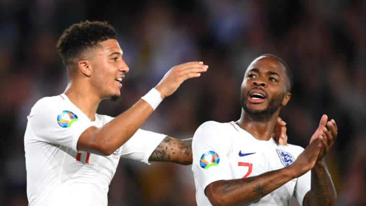 SOUTHAMPTON, ENGLAND - SEPTEMBER 10: Jadon Sancho of England celebrates with team mates Raheem Sterling after scoring his sides fifth goal during the UEFA Euro 2020 qualifier match between England and Kosovo at St. Mary's Stadium on September 10, 2019 in Southampton, England. (Photo by Clive Mason/Getty Images)