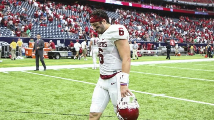 Sep 3, 2016; Houston, TX, USA; Oklahoma Sooners quarterback Baker Mayfield (6) walks off the field after a game against the Houston Cougars at NRG Stadium. The Cougars defeated the Sooners 33-23. Mandatory Credit: Troy Taormina-USA TODAY Sports