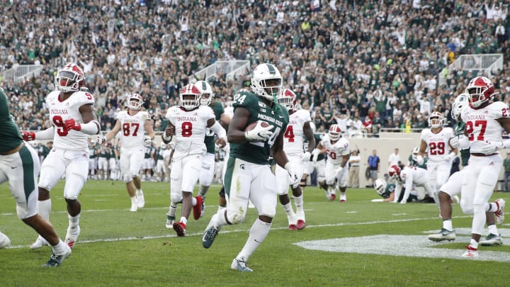 EAST LANSING, MI – SEPTEMBER 28: Elijah Collins #24 of the Michigan State Spartans runs for a four-yard touchdown in the first quarter against the Indiana Hoosiers at Spartan Stadium on September 28, 2019 in East Lansing, Michigan. (Photo by Joe Robbins/Getty Images)