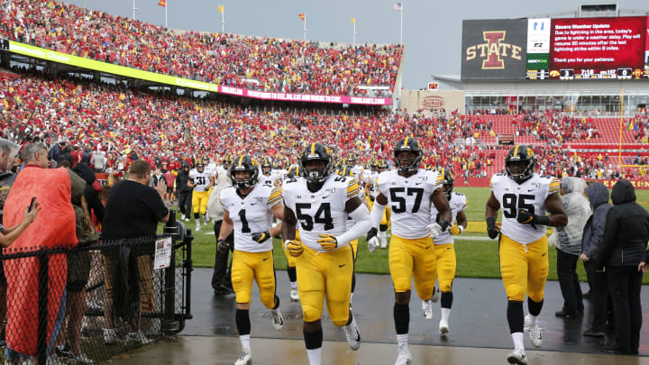 AMES, IA – SEPTEMBER 14: The Iowa Hawkeyes leave the playing field for a lighting delay in the first quarter of play against the Iowa State Cyclones at Jack Trice Stadium on September 14, 2019 in Ames, Iowa. (Photo by David Purdy/Getty Images)
