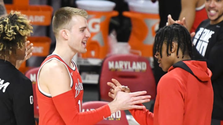 COLLEGE PARK, MD - FEBRUARY 08: Justin Ahrens #10 and Musa Jallow #2 of the Ohio State Buckeyes during introductions of a college basketball game against the Maryland Terrapins at Xfinity Center on February 8, 2021 in College Park, Maryland. (Photo by Mitchell Layton/Getty Images)
