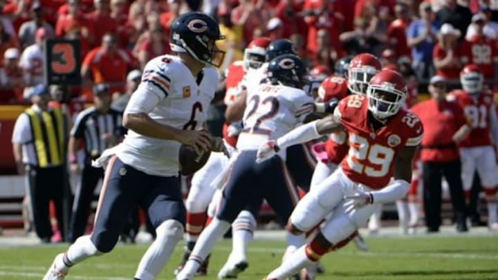 Oct 11, 2015; Kansas City, MO, USA; Chicago Bears quarterback Jay Cutler (6) is pressured by Kansas City Chiefs free safety Eric Berry (29) in the first half at Arrowhead Stadium. Mandatory Credit: John Rieger-USA TODAY Sports