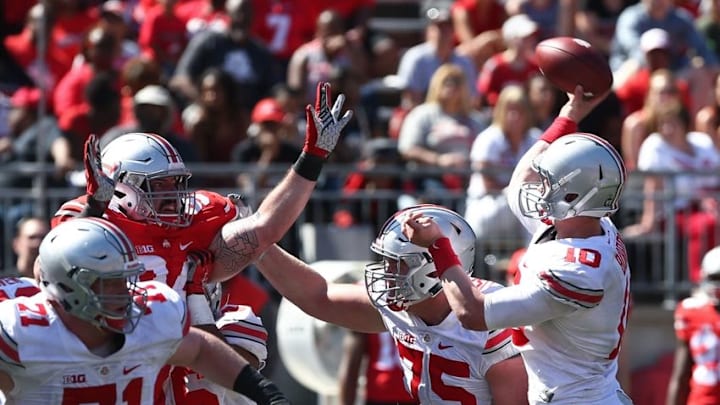 Apr 16, 2016; Columbus, OH, USA; Ohio State Gray Team quarterback Joe Burrow (10) throws the ball during the Ohio State Spring Game at Ohio Stadium. Mandatory Credit: Aaron Doster-USA TODAY Sports