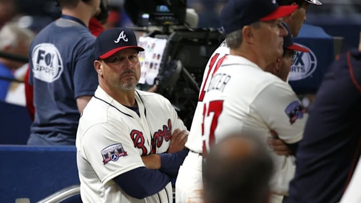 Apr 23, 2016; Atlanta, GA, USA; Atlanta Braves manager Fredi Gonzalez (33) is shown in the dugout during the eighth inning of their game against the New York Mets at Turner Field. The Mets won 8-2. Mandatory Credit: Jason Getz-USA TODAY Sports