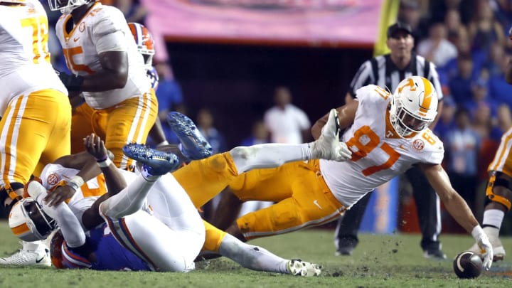 Sep 25, 2021; Gainesville, Florida, USA; Tennessee Volunteers tight end Jacob Warren (87) recovers the fumble against the Florida Gators during the fourth quarter at Ben Hill Griffin Stadium. Mandatory Credit: Kim Klement-USA TODAY Sports