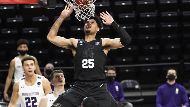 Dec 20, 2020; Evanston, Illinois, USA; Michigan State Spartans forward Malik Hall (25) dunks the ball against the Northwestern Wildcats during the first half at Welsh-Ryan Arena. Mandatory Credit: David Banks-USA TODAY Sports